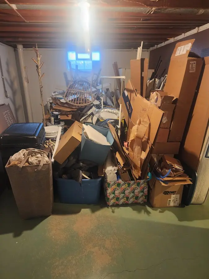 Roll-off dumpster container at job site for 6 Yard Dumpster Rental in Victor